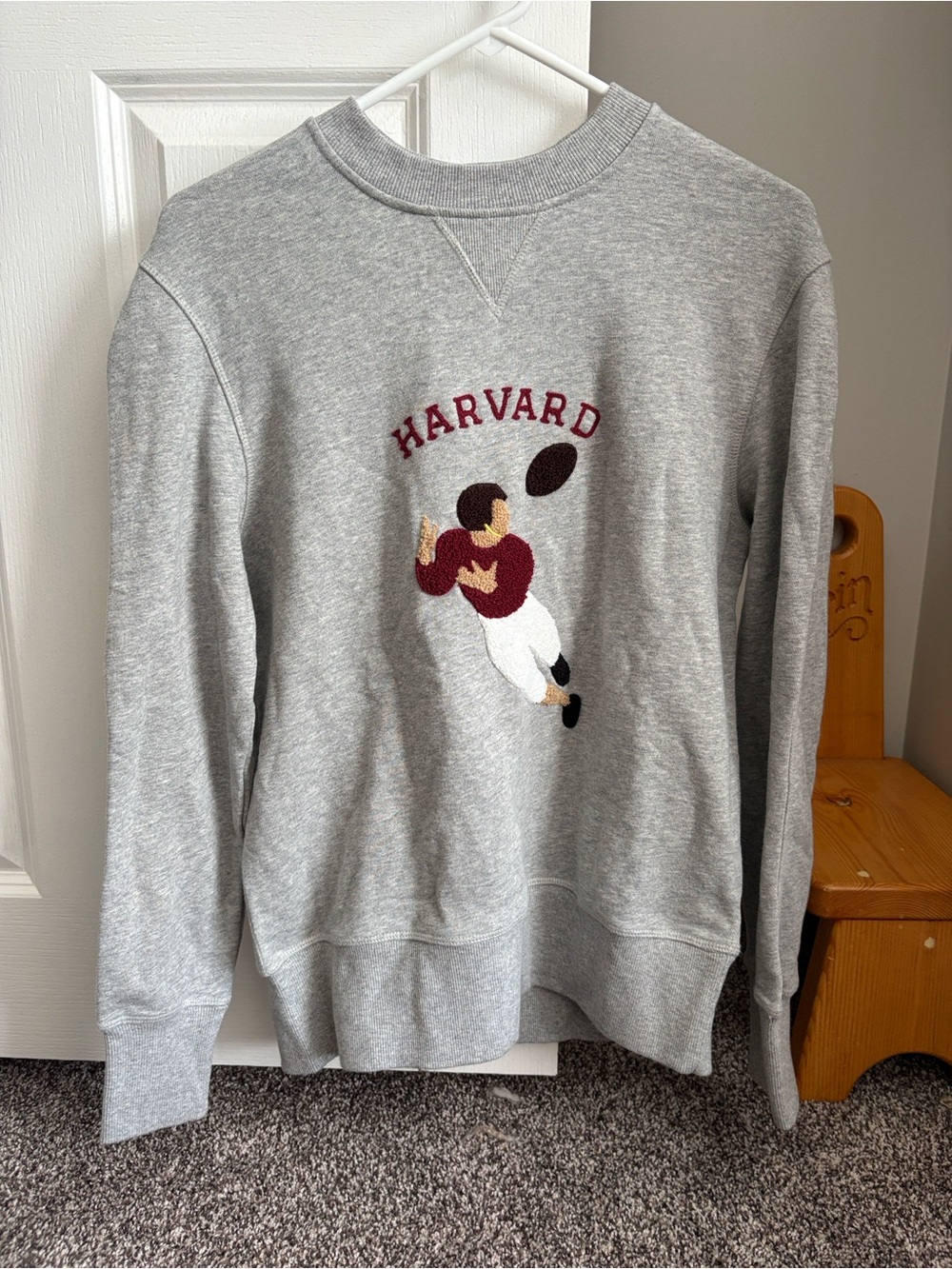 Harvard Grey Crewneck Sweatshirt with Football Graphic